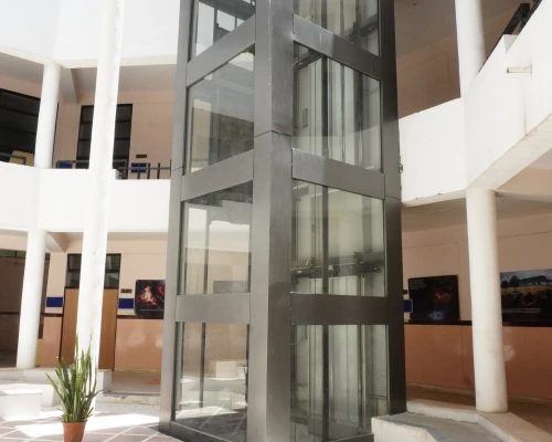 Wheelchair user entering an accessible elevator